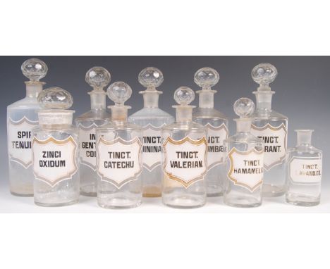 A collection of ten early 20th century antique vintage apothecary chemist medicine glass jars each having the original printe
