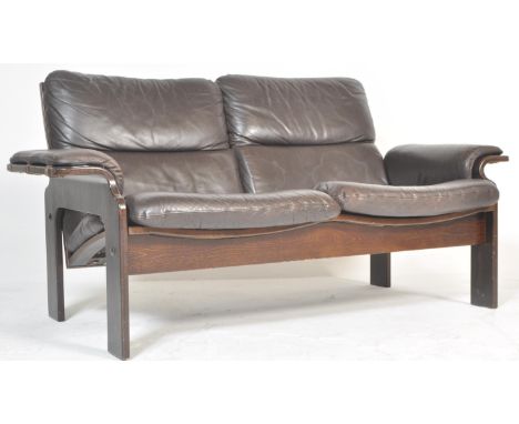 An original retro vintage 1970's Jeki Mobler made two-seater sofa settee. Stained beech show wood frame, with bentwood shaped