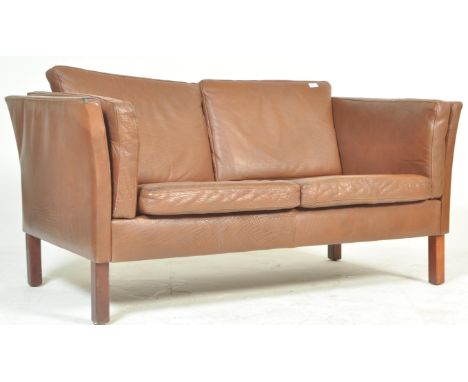 An original retro vintage 1970's London style Danish / Scandinavian two-seater sofa settee. Light brown leather / buffalo hid