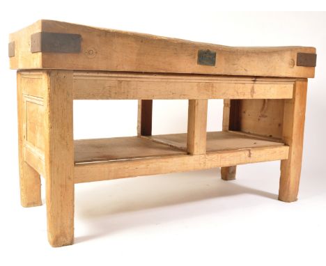 William Douglas &amp; Sons Ltd - A superb vintage 20th Century butchers block of rectangular form raised on a sturdy stripped