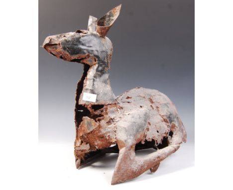 A 20th century retro vintage studio art metal work sculpture depicting a deer / bambi in a recumbent seated position and havi