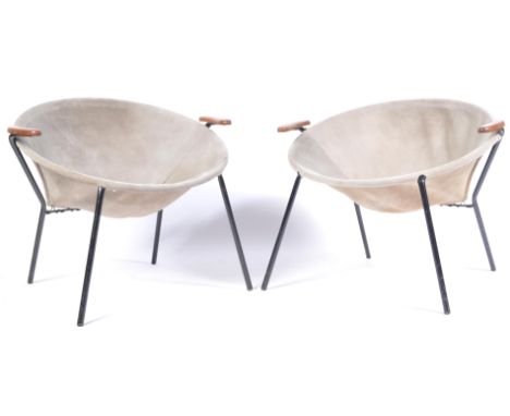 A pair of 20th century retro vintage satellite easy / hammock chair / armchairs constructed from an ebonised tubular circular