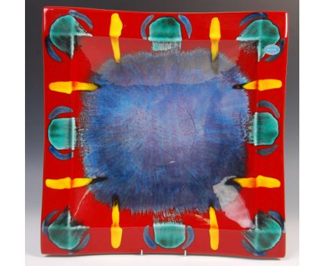 Poole Pottery - Living Glaze - A contemporary studio pottery large volcano glazed red and blue square dish having a dished ce