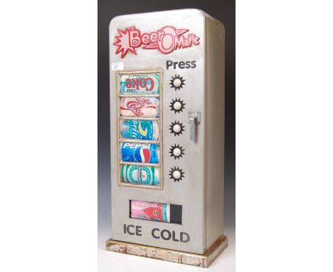 A late 20th century retro counter top cupboard in the form of a vintage drinks vending machine with the name ' Beer-O-Matic '