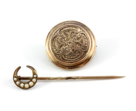 A 15ct yellow gold pearl set tie pin and a yellow metal faced (face tested minimum 9ct gold) brooch, Dia. 2.1cm.