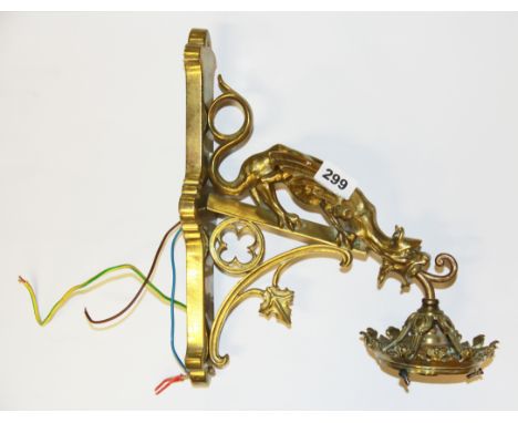 A 19th Century Gothic Revival brass bracket light fitting, H. 33cm.