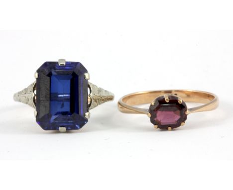 Two 9ct yellow gold stone set rings (J.5 & M.5).