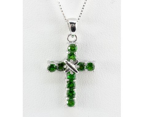 A 925 silver chrome diopside set cross pendant and chain.