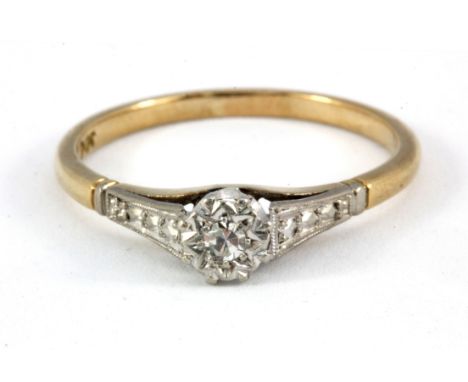 A 9ct yellow gold diamond set solitaire ring, (R).