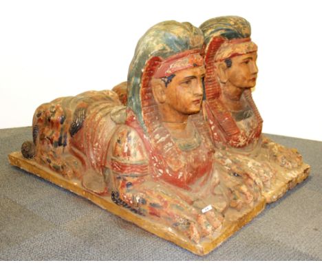 Architectural interest. A superb pair of large 19th Century painted and gessoed carved wooden figures of sphinx, 119 x 47 x 7