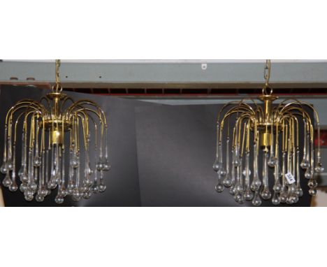 A pair of 'waterdrop' gilt and glass light fittings, H. 64cm.