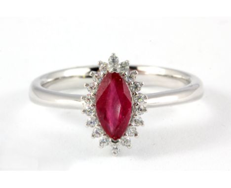 A 925 silver ring set with a marquise cut ruby and white stones, (N).