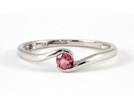 A 9ct white gold brilliant cut pink tourmaline set solitaire ring, (O.5).