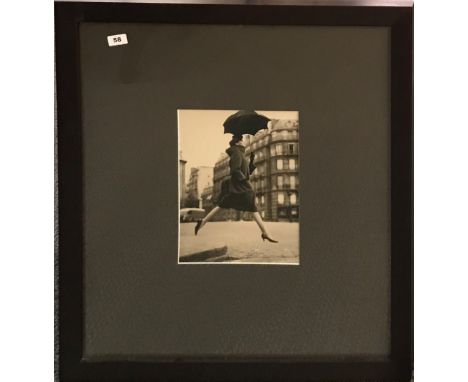 A framed 1950's photographic print of Audrey Hepburn, 72 x 80cm.