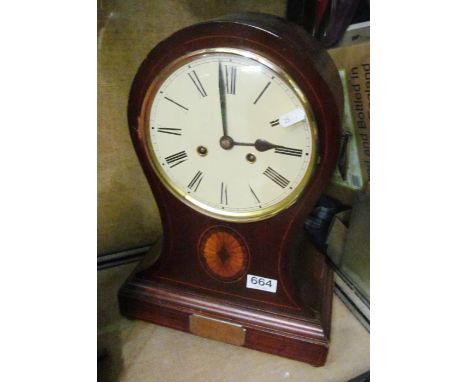 An Edwardian mahogany mantel clock