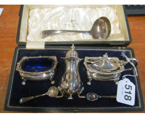 A Walker &amp; Hall silver plated condiment set (i.c) and a plated ladle