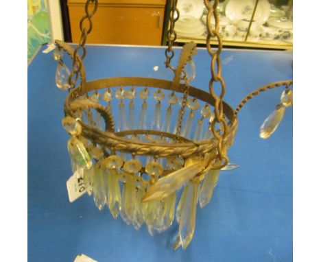 A three tier drop lustre chandelier
