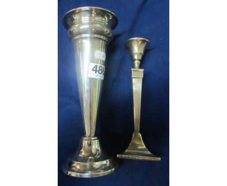 A silver spill vase and a silver candlestick (both slightly a/f)