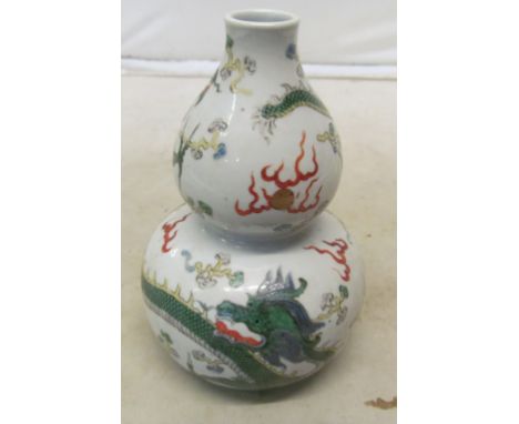 A Chinese double gourd vase Hi seems to be okJust put blue light on and nothing showing7” highGlaze quite thick on neckRough 