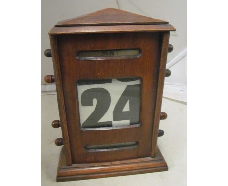 An oak calendar and clock