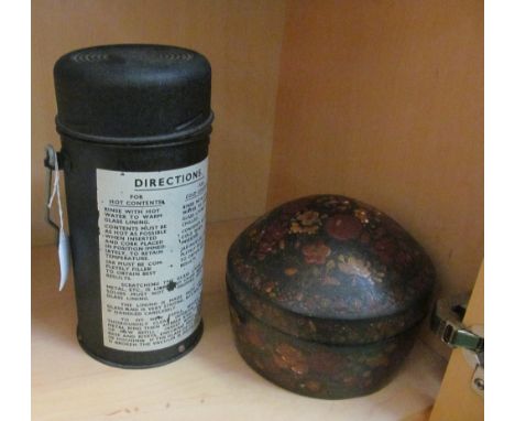 A papier mache circular lidded container and vintage vacuum flask