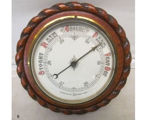 An oak barometer ropetwist rim