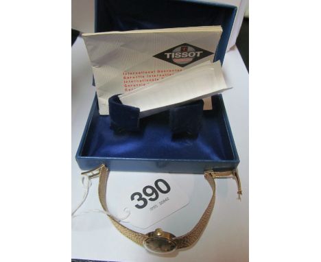 A 9ct gold Tissot ladies watch