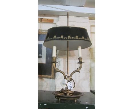 A brass two branch table light