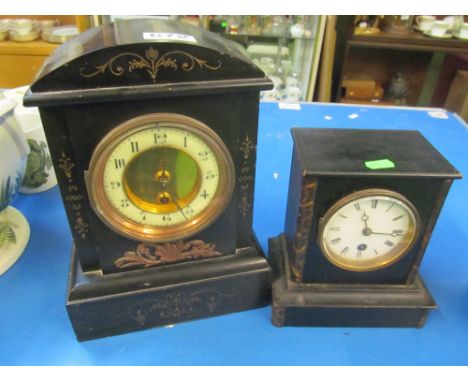 A marble clock and another clock