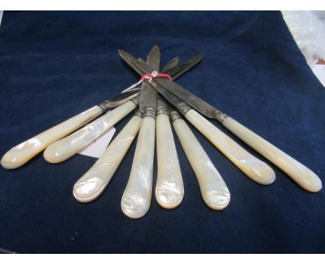 A set of eight mother of pearl handled knives, marked Cardeilhac