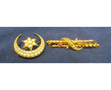 A seed pearl crescent brooch and a 15ct gold bar brooch set seed pearls and red stones