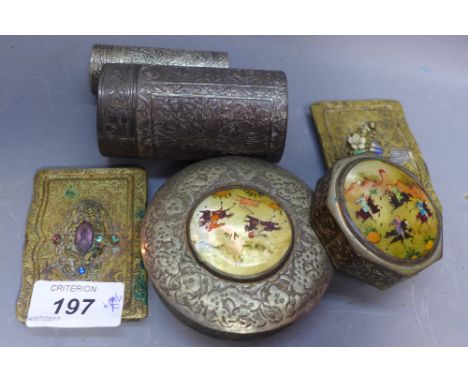 A pair of Middle Eastern gilt metal card cases, engraved design and raised floral decoration to cover, together with Persian 