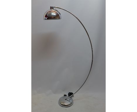 A retro floor standing chrome arch lamp. 
