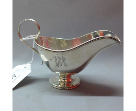 A sterling silver gravy boat. 