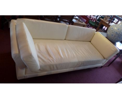 A contemporary white leather three seater sofa from Habitat, H:67cm W:217cm D:90cm