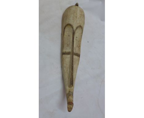 An African carved wooden fang mask. H-116cm 