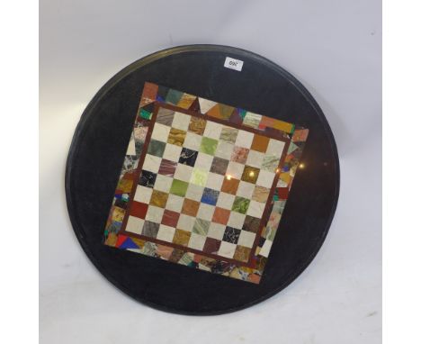 A circular marble chess board with specimen stone inlay, diameter: 62cm