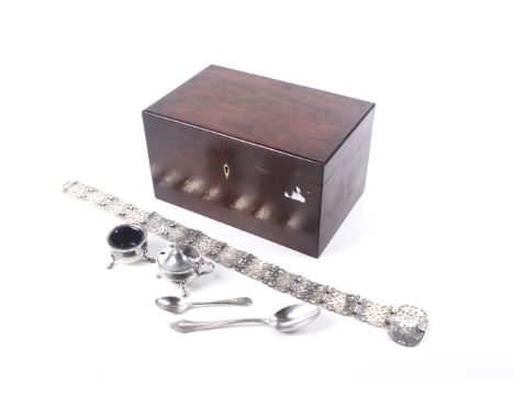 A Victorian mahogany box and contents. The rectangular box with a bone escutcheon, containing a silver plated belt, condiment
