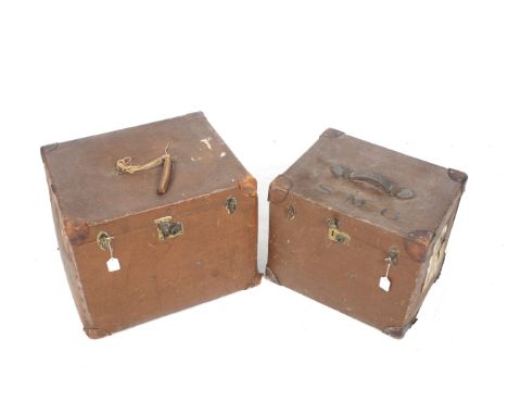 A vintage set of travelling luggage of two cases. Consisting of canvas covered case with leather corners one made by A. Boswe