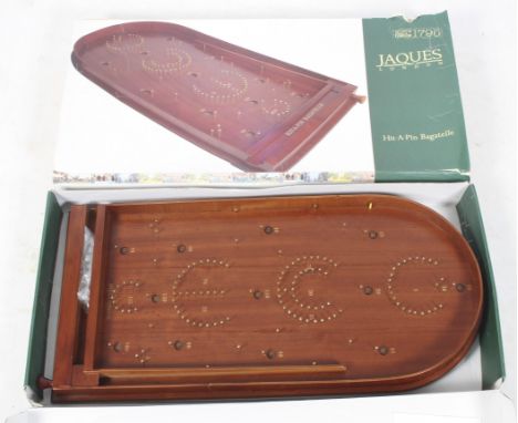 A contemporary Jaques London Hit-A-Pin bagatelle board in box. 74cm long