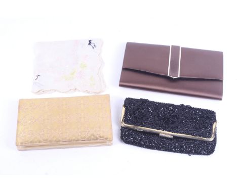 Three 20th century and later ladies clutch bags and a oriental embroidered handkerchief. The bags comprising an Italian embos