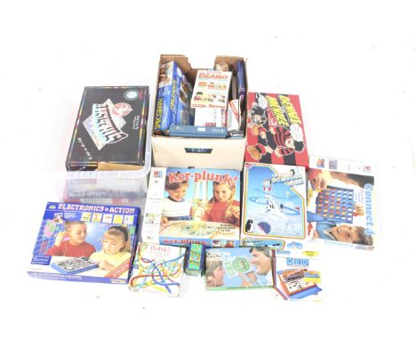 A collection of vintage games. Including Connect 4, Ker-Plunk, Score Ball, etc. in the original boxes