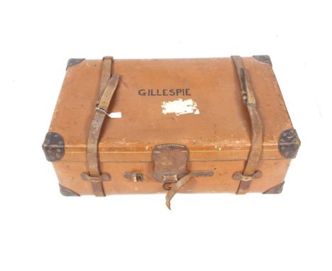 A large vintage leather travelling case. With twin dark leather handles and two straps, the exterior stamped 'Gillespie', H32