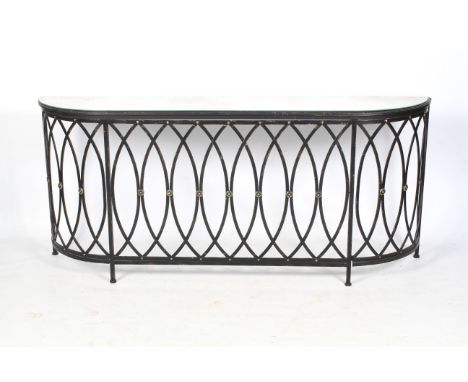 A contempoarary console table radiator guard with curved edges. The lower section constructed of a vintage metal frame, paint