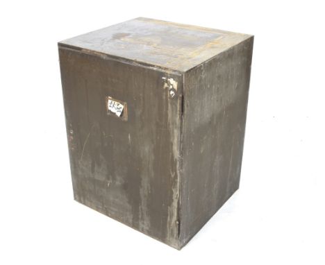A vintage metal storage unit. Painted brown, the door opening to reveal twenty-three drawers (one missing), H73.5cm x W56.5cm