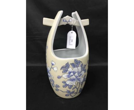 CERAMIC ASIAN PLANTER AND STOOLhand painted in Hong Kong with blue and white floral decoation, along with two black ceramic p