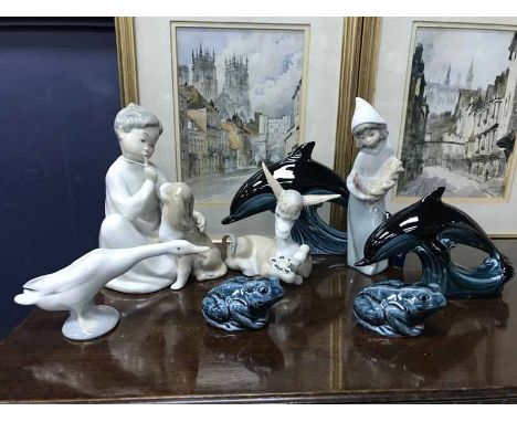 FOUR LLADRO FIGURESincluding animals and children; along with four Poole figures 