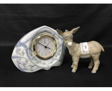 FOUR CERAMIC ANIMALSand a Lladro clock