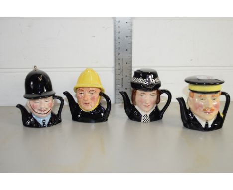 MINIATURE CERAMIC TEA POTS MODELLED AS FIREMEN AND POLICEMEN