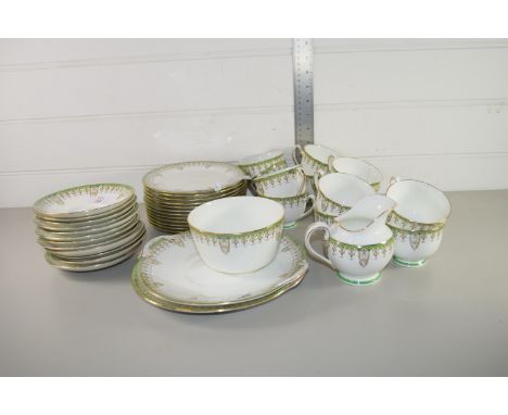 TEA WARES BY ROYAL DOULTON IN THE TIVOLI PATTERN COMPRISING SANDWICH PLATE, SIDE PLATES, CUPS AND SAUCERS, MILK JUG AND SUGAR